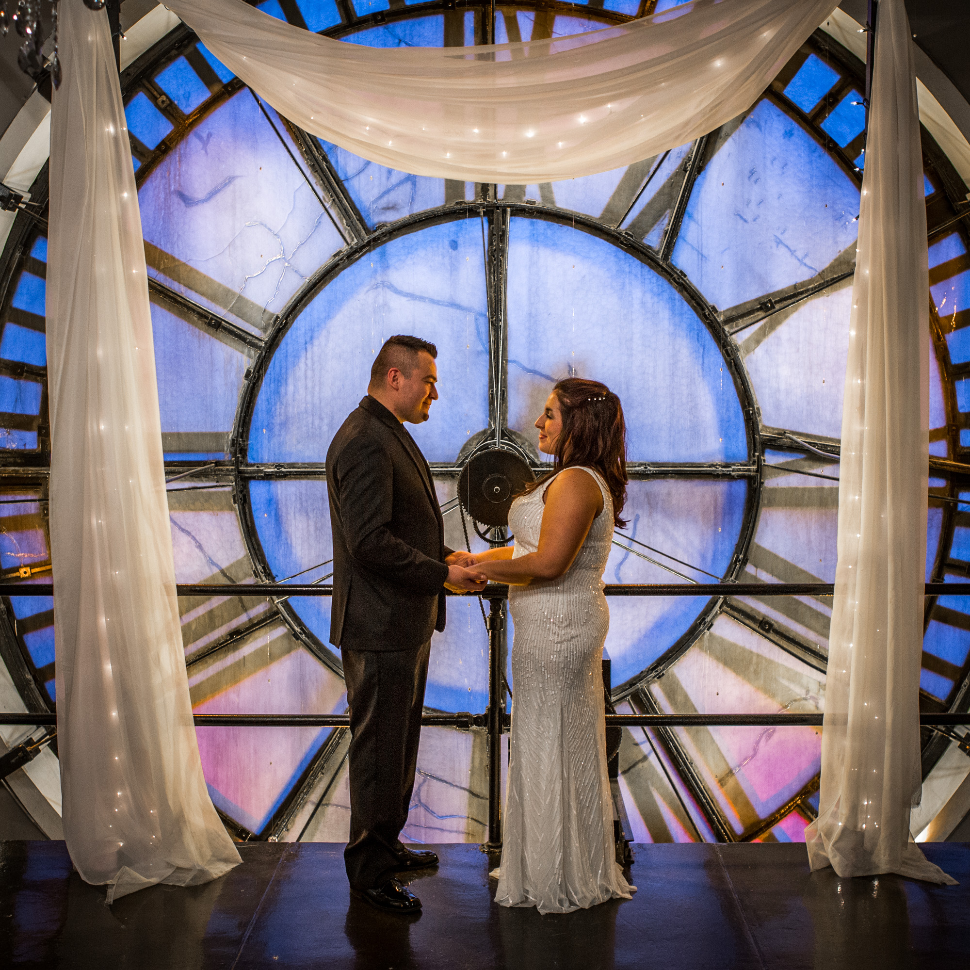 Bride and Groom Holding Hands During Their Wedding Ceremony